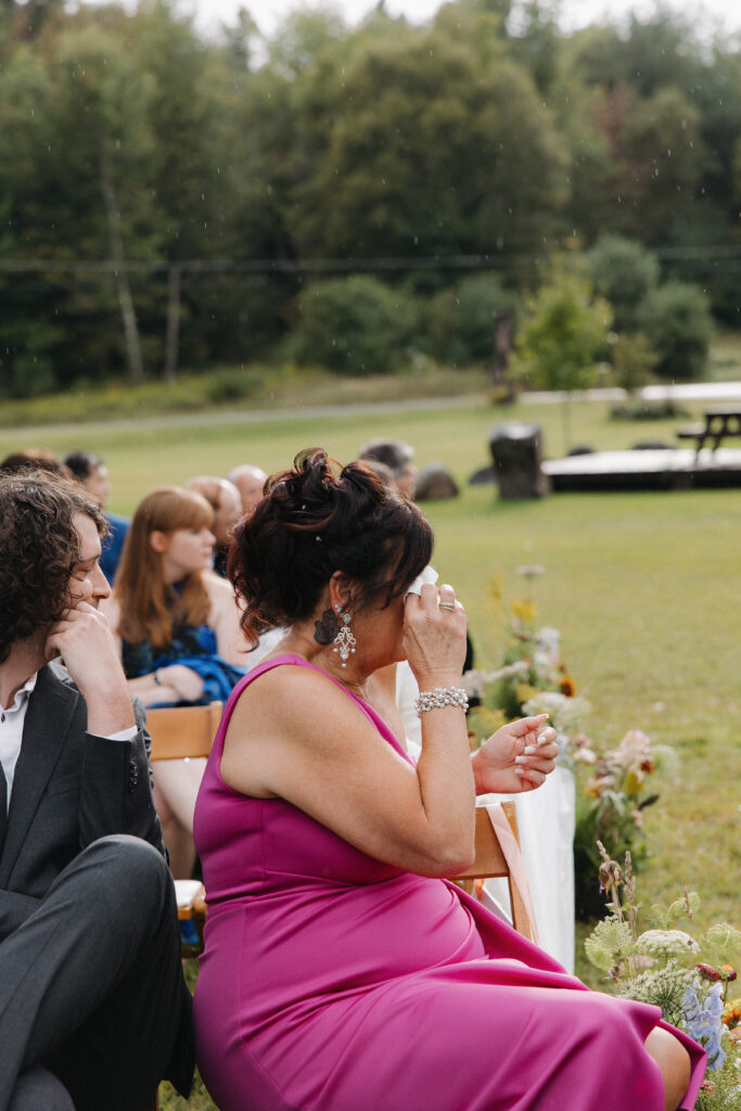 mother of the bride crying at the wedding ceremony