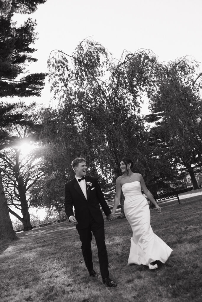 Black-and-white documentary wedding photography, outdoor summer wedding. 