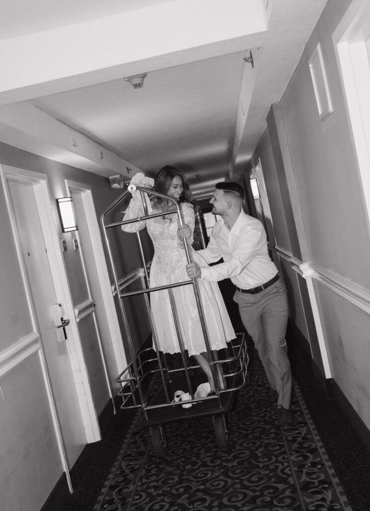 Black and white editorial wedding photography of the bride and groom after their wedding rehearsal. 